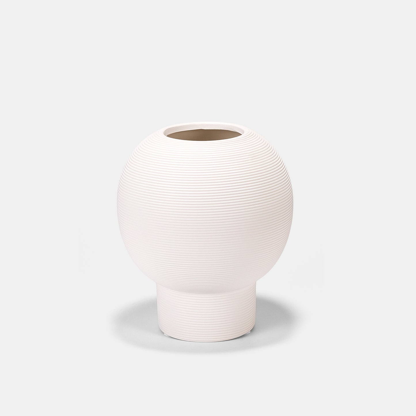 Artisanal pottery vase with crackle-glaze detailing. This white vase mimics antique ceramics, offering timeless charm. The ceramic vase’s wide mouth accommodates voluminous blooms as a white floral vase, while its curved silhouette adds vintage flair to farmhouse tablescapes.