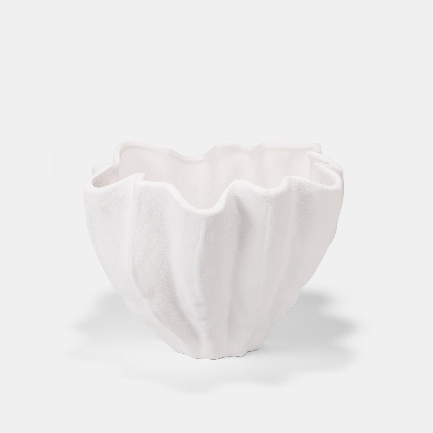 This huge ceramic vase pairs weightless ease with stone-like grandeur. Textured ridges elevate peonies or citrus displays, while the undulating rim adds organic modernism. Use as a flower vase with cascading blooms or a sculptural white vase for entryways. Matte finish harmonizes with seasonal decor transitions.