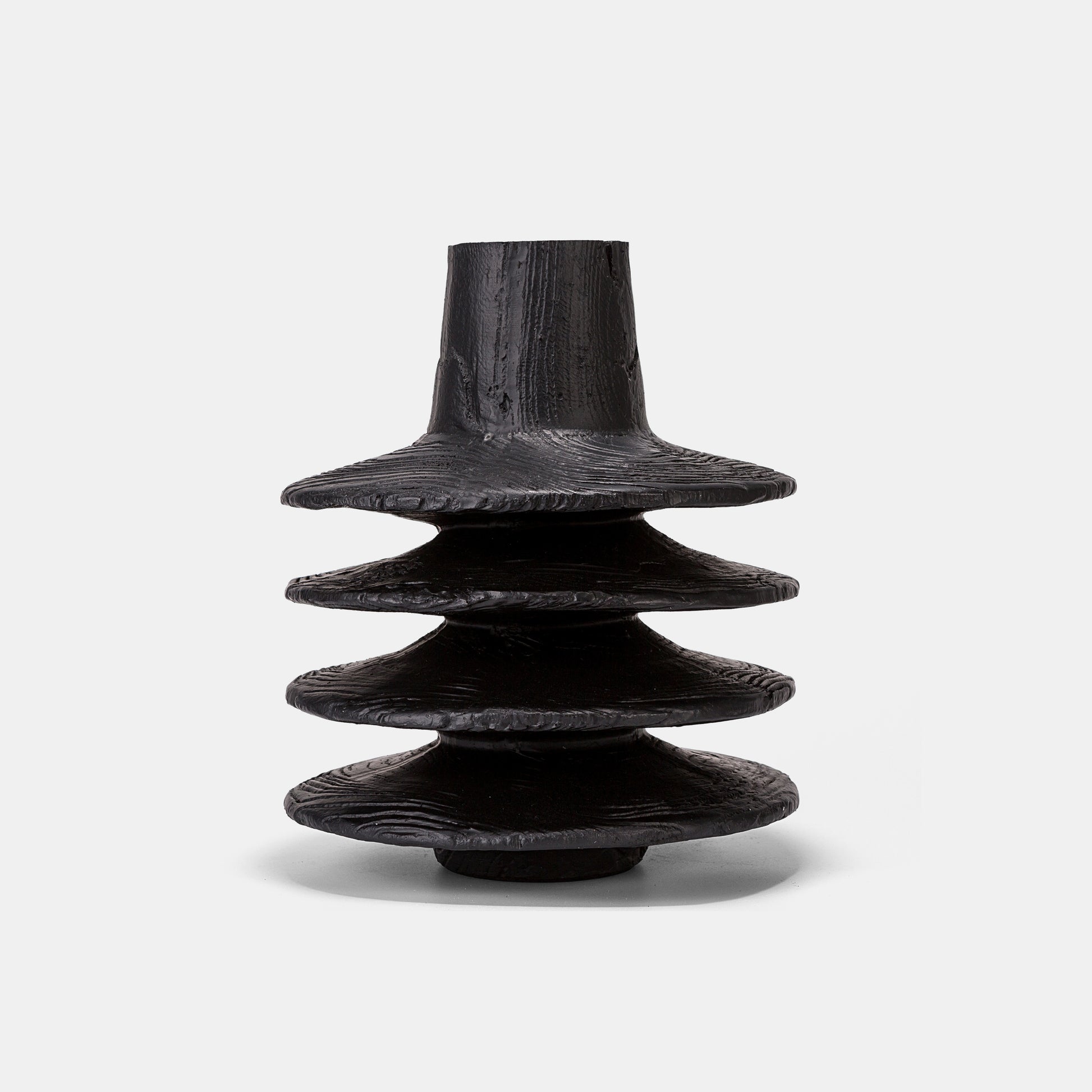 Sustainable black large vase crafted from recycled resin, coordinating with modular floor vases and stackable bud vases. Cheap vase eco-conscious option for green interior schemes.