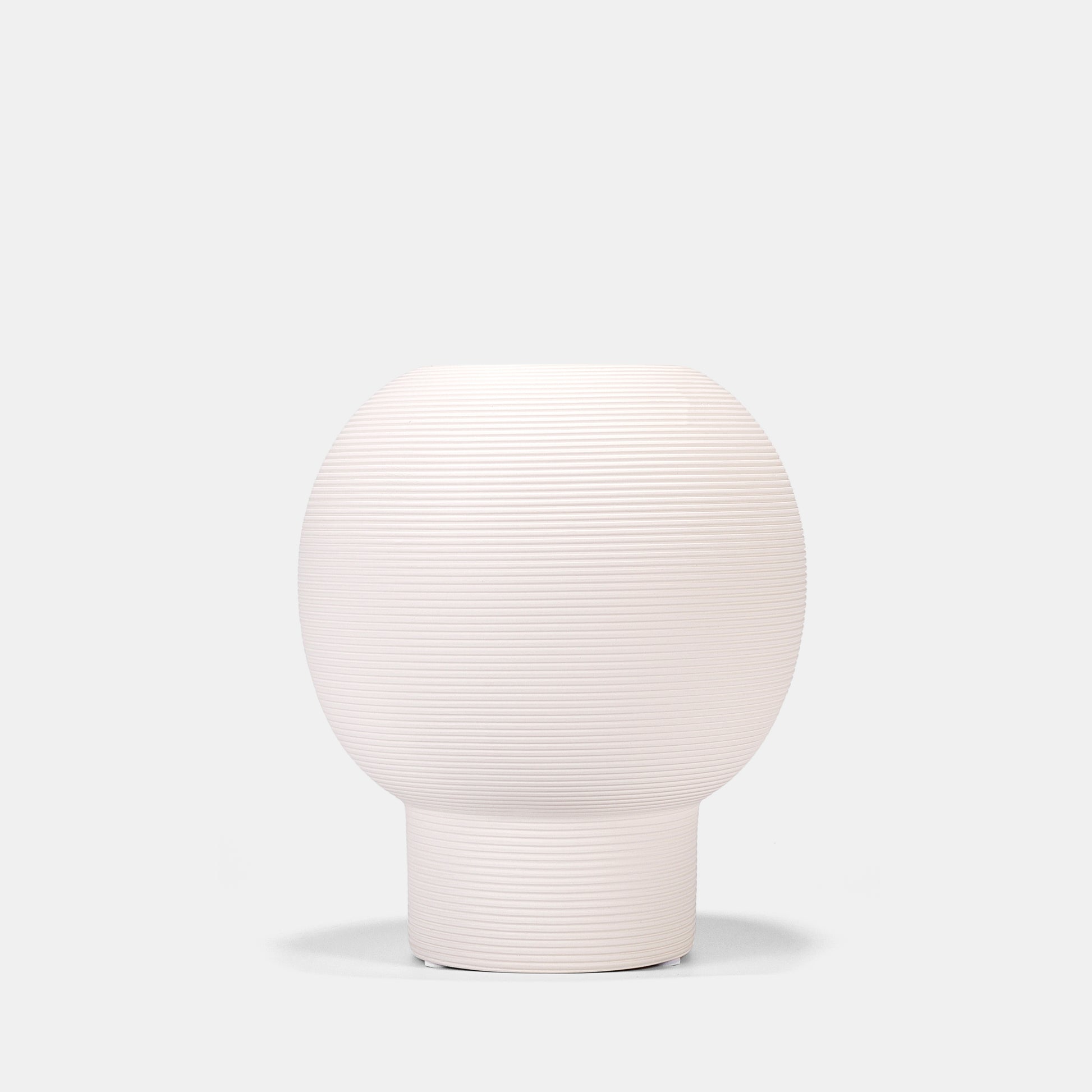 Versatile white color vase serving dual roles – display fresh stems in this ceramic vase or repurpose as a chic utensil holder. The pottery vase’s neutral white floral vase design transitions effortlessly from dining tables to office desks. Dishwasher-safe and fade-resistant.
