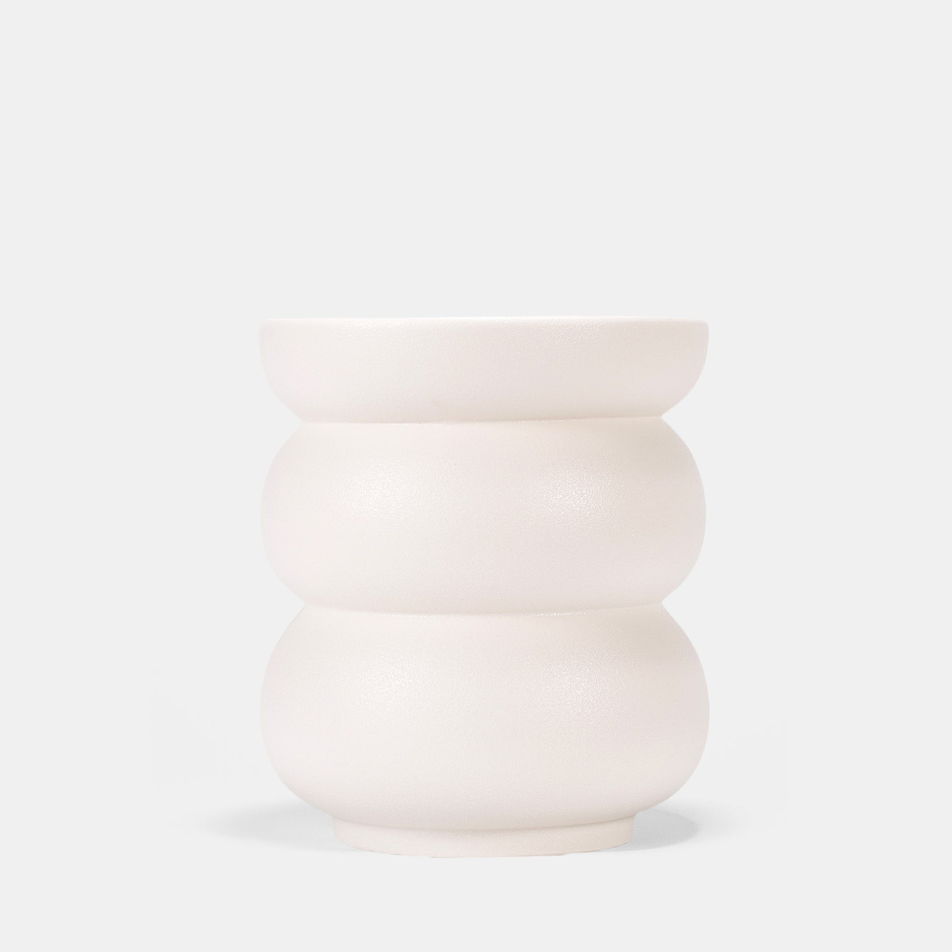 Celebrate softness with this white ceramic vase inspired by human curves. Matte glaze enhances skin-like luminosity, thriving with flowers or bare elegance. Mix with tall bud vases for dynamic displays. Crafted for body-positive interiors and harvest-themed spaces—luxury redefined through organic form. 
