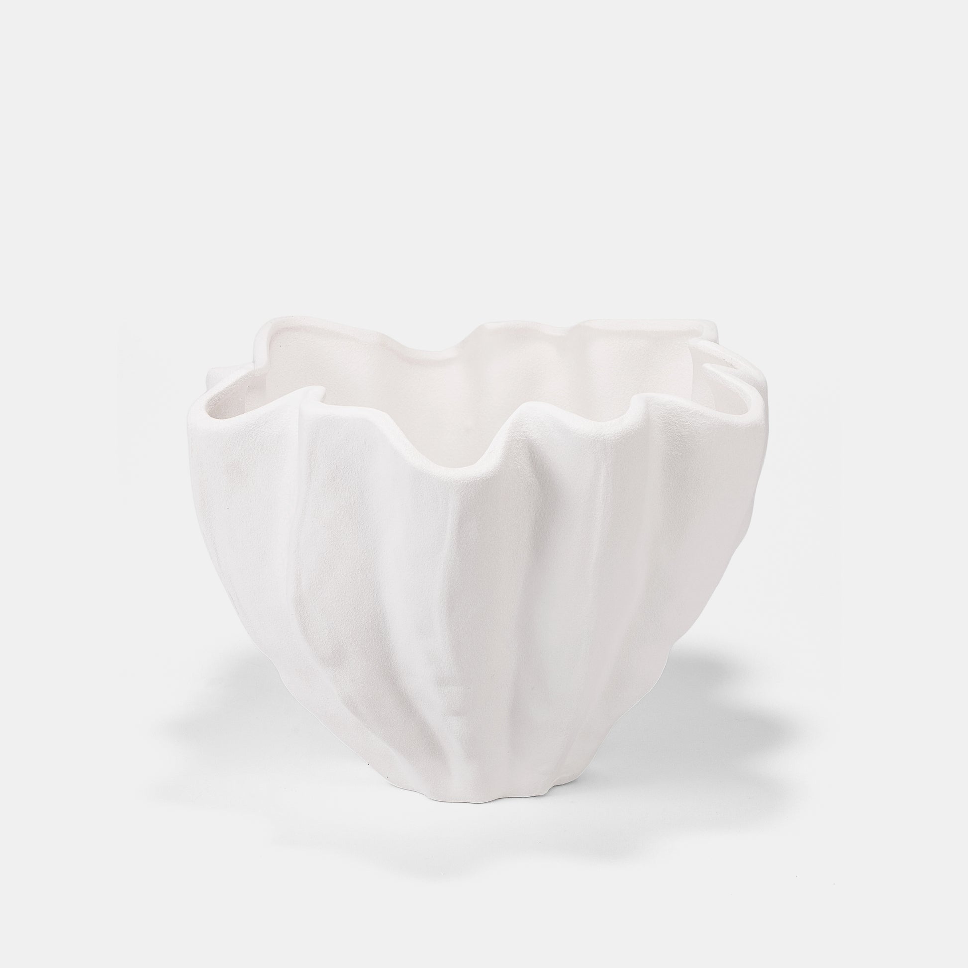 This huge ceramic vase pairs weightless ease with stone-like grandeur. Textured ridges elevate peonies or citrus displays, while the undulating rim adds organic modernism. Use as a flower vase with cascading blooms or a sculptural white vase for entryways. Matte finish harmonizes with seasonal decor transitions.