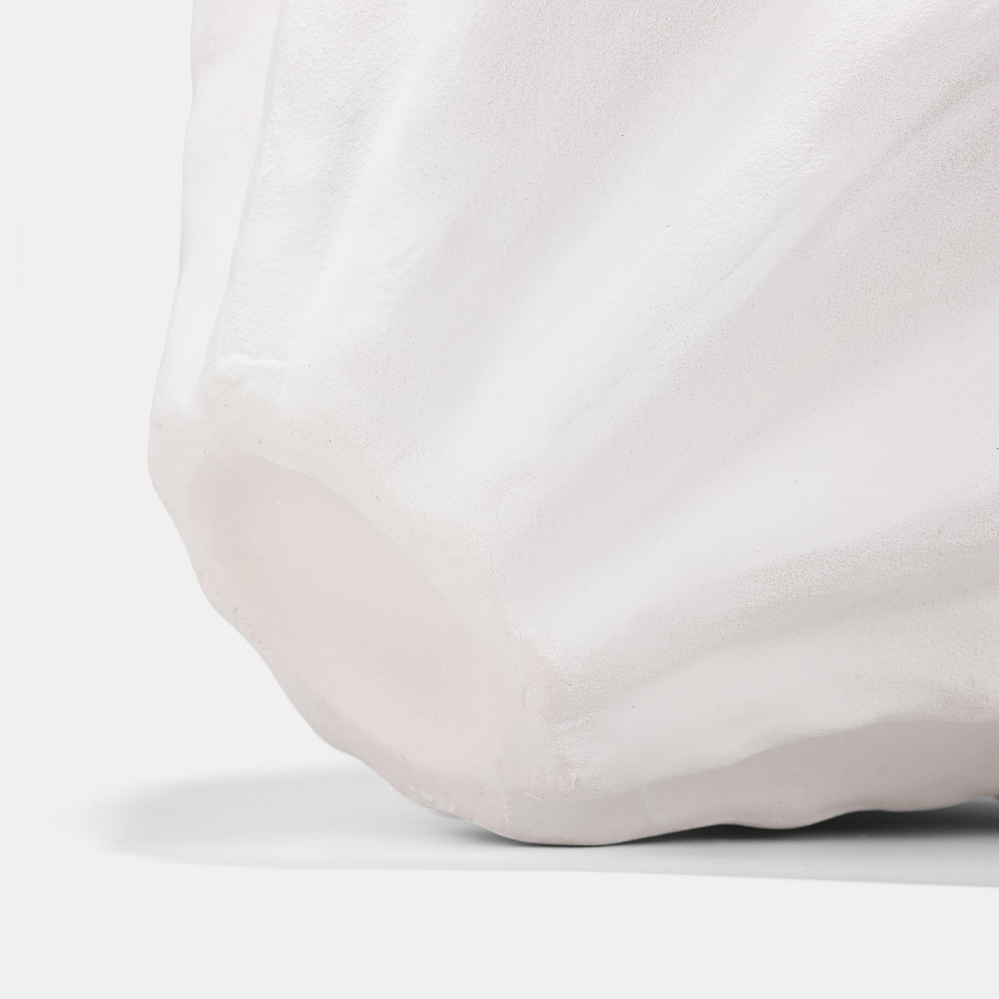 This bold white ceramic vase merges art and function with cascading ridges and a sculptural undulating rim. At 22cm tall, this huge vase commands attention as a statement flower vase for grand peony bouquets or dried botanicals. Lightweight ceramic mimics stone-carved elegance, ideal for entryway centerpieces or modern bud vases with curated stems in textured crevices.
